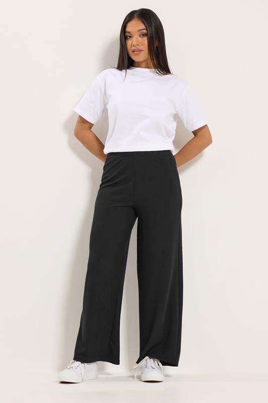 M&Co Petite Black Ribbed Wide Leg Trousers | M&Co 1