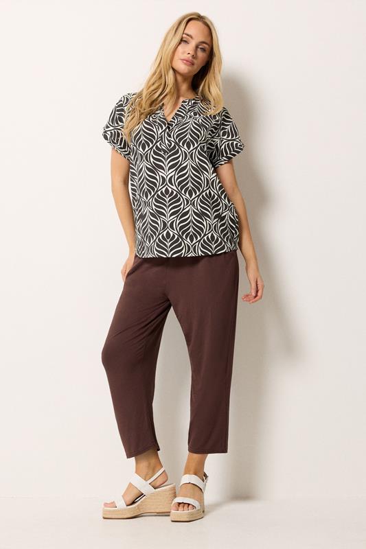 M&Co Brown Leaf Print Notch Neck Top | M&Co 1