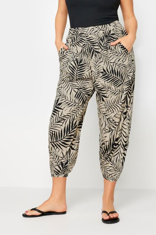 YOURS Plus Size Beige Brown Leaf Print Cropped Harem Trousers | Yours Clothing 1