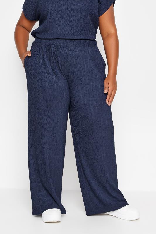 YOURS Plus Size Navy Blue Crinkle Plisse Wide Leg Trousers | Yours Clothing 1