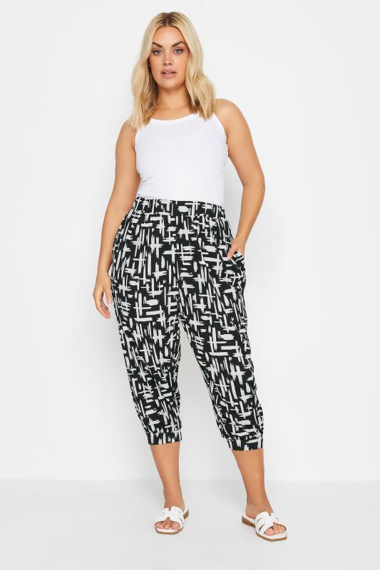 YOURS Plus Size Black Stripe Cropped Harem Joggers | Yours Clothing 1