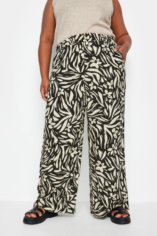 YOURS Plus Size Black Floral Print Wide Leg Trousers | Yours Clothing 1