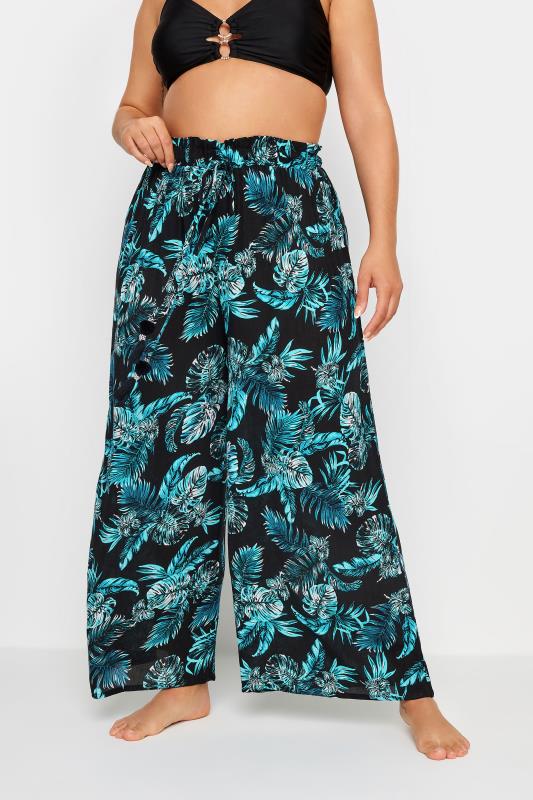 YOURS Plus Size Black Tropical Print Crinkle Tassel Trousers | Yours Clothing 1