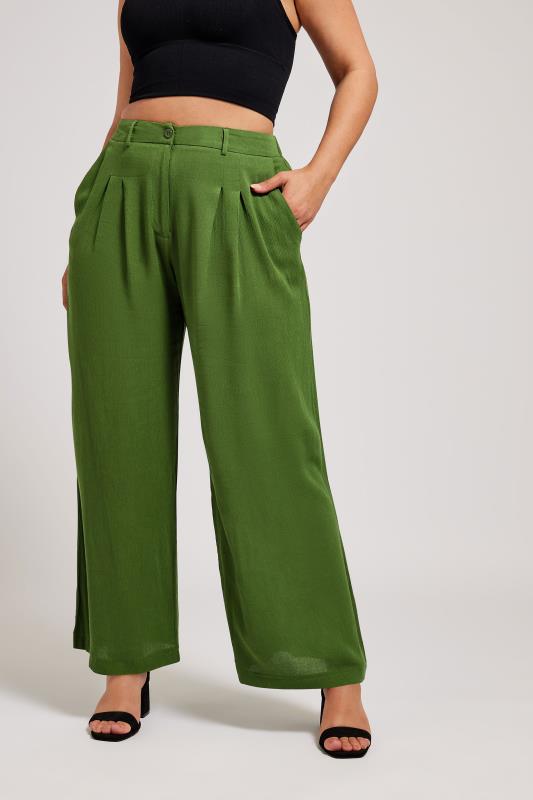 YOURS LONDON Plus Size Green Pleat Front Wide Leg Trousers | Yours Clothing 1