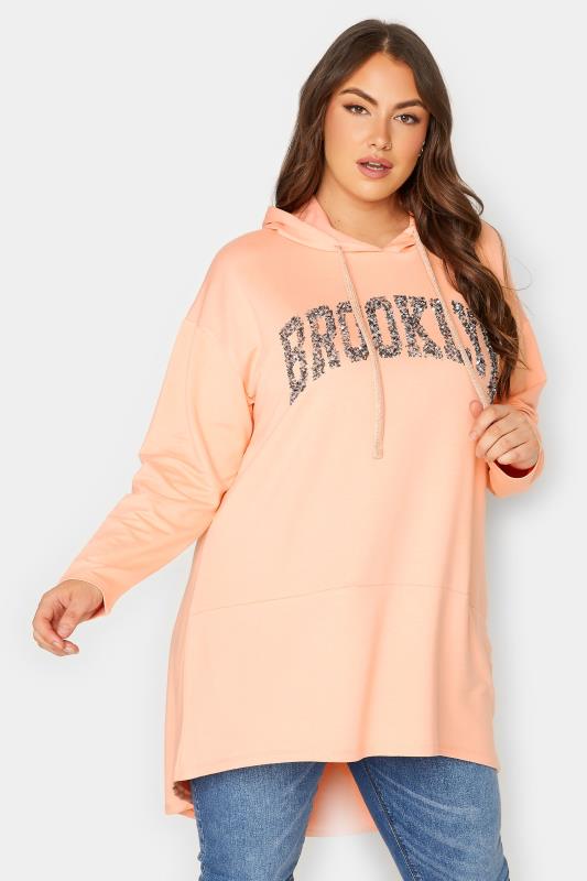 YOURS Plus Size Curve Light Orange 'Brooklyn' Slogan Longline Hoodie | Yours Clothing  1