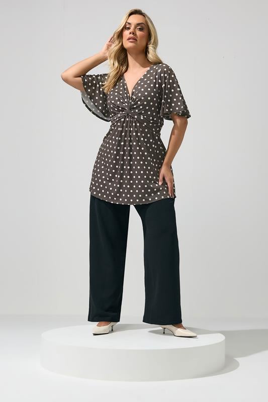 YOURS LONDON Plus Size Chocolate Brown Polka Dot Knot Front Top | Yours Clothing 1