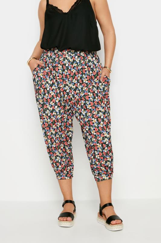 YOURS Plus Size Black Ditsy Floral Print Cropped Harem Trousers | Yours Clothing 1