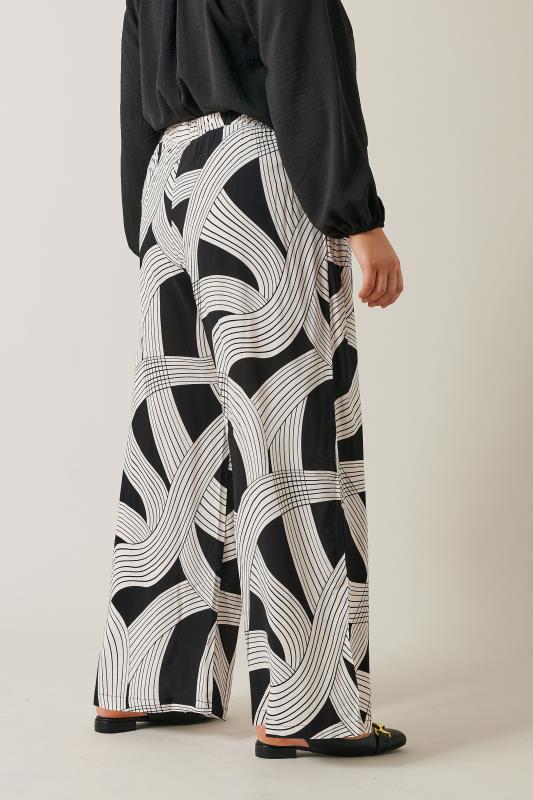 EVANS Plus Size Black Linear Print Wide Leg Trousers | Evans 3