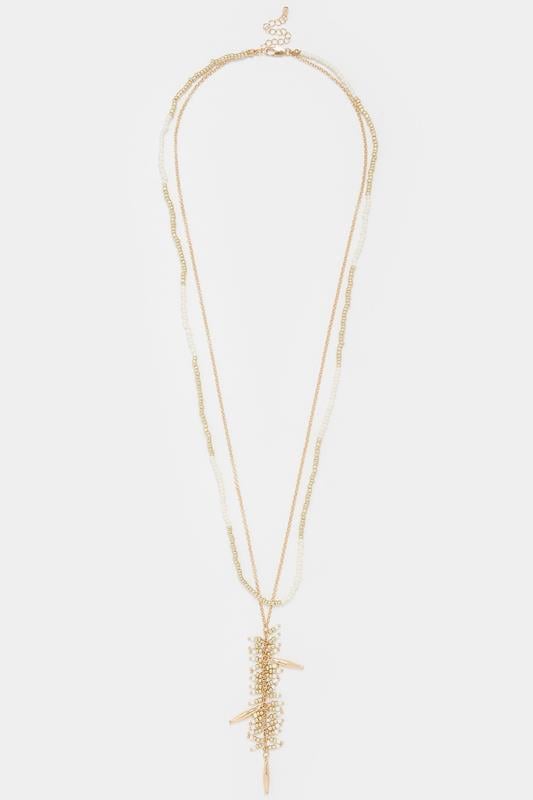 Collier long de perles doré