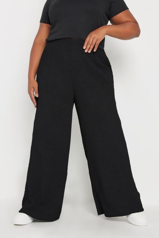 YOURS Plus Size Black Textured Elasticated Wide Leg Trousers | Yours Clothing 1