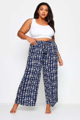 YOURS Plus Size Navy Blue Ikat Print Crinkle Tassel Trousers | Yours ...