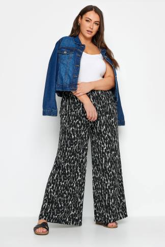 YOURS Plus Size Black Leopard Print Wide Leg Trousers | Yours Clothing