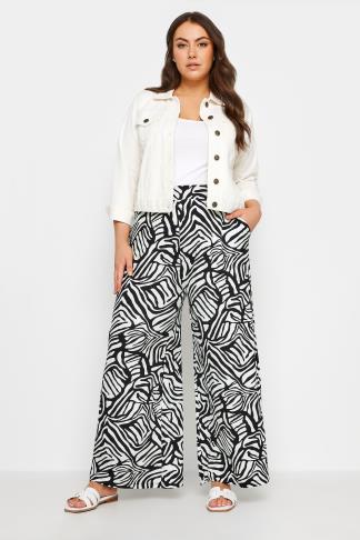 YOURS Plus Size Black Abstract Print Wide Leg Trousers | Yours Clothing