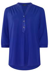 M&Co camisa azul con media tapeta y sin cuello