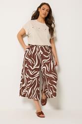 YOURS Plus Size Brown Abstract Cropped Wide Leg Trousers | Yours Clothing 1