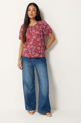 M&Co Petite Orange Abstract Print Scoop Neck Top | M&Co 1