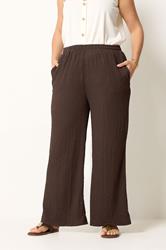 YOURS Plus Size Chocolate Brown Bubble Textured Wide Leg Trousers | Yours Clothing 1