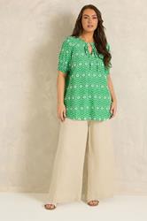 EVANS Plus Size Green Floral Broderie Tie Neck Blouse | Evans 1