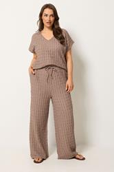 YOURS Plus Size Brown Bubble Textured Wide Leg Trousers | Yours Clothing 1