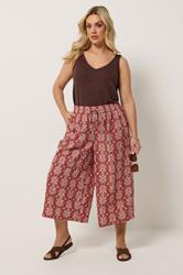 YOURS Plus Size Rust Orange Palm Tree Cropped Trousers | Yours Clothing 1