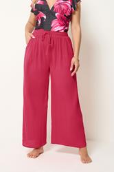 YOURS Plus Size Hot Pink Crinkle Texture Wide Leg Trousers | Yours Clothing 1