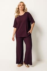 YOURS Plus Size Burgundy Red Bubble Texture Wide Leg Trousers | Yours Clothing 1