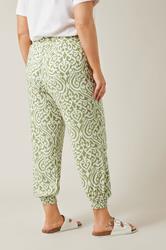 EVANS Plus Size Green Ikat Print Cuffed Harem Trousers | Evans  2