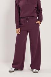 PixieGirl Petite Women's Burgundy Red 'Monte Carlo' Slogan Wide Leg Joggers | PixieGirl 1