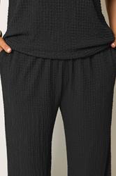 YOURS Plus Size Black Bubble Texture Wide Leg Trousers | Yours Clothing 4