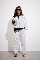 PixieGirl Petite Women's White Polka Dot Crinkle Barrel Leg Trousers | PixieGirl 1