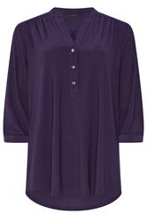 M&Co camisa morada con media tapeta y sin cuello