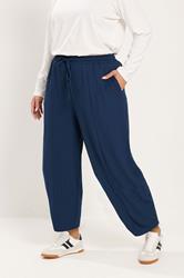 YOURS Plus Size Navy Blue Crinkle Barrel Trousers | Yours Clothing 1