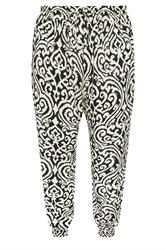 EVANS Pantalon sarouel resserré aux chevilles noir à imprimé ikat