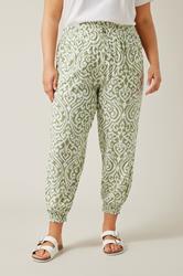 EVANS Plus Size Green Ikat Print Cuffed Harem Trousers | Evans  1