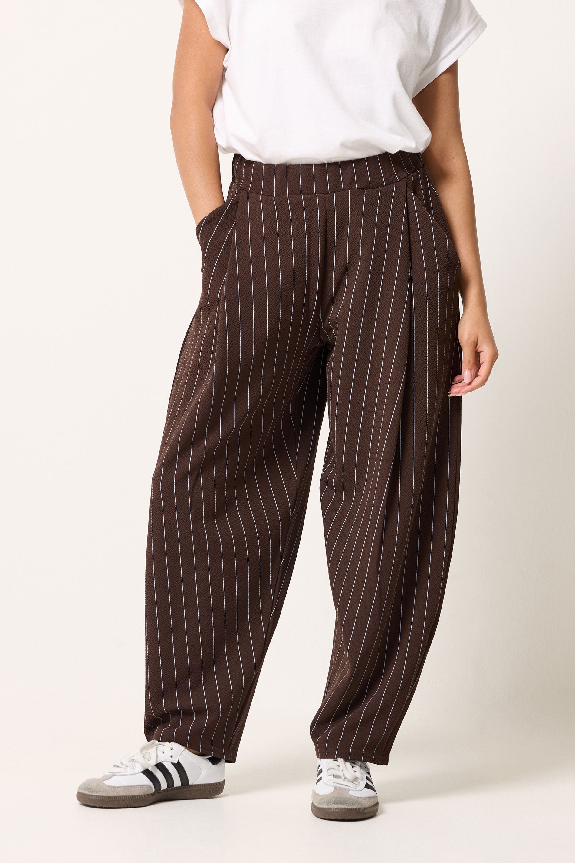 PixieGirl Petite Women's Chocolate Brown Pinstripe Barrel Leg Trousers | PixieGirl 1