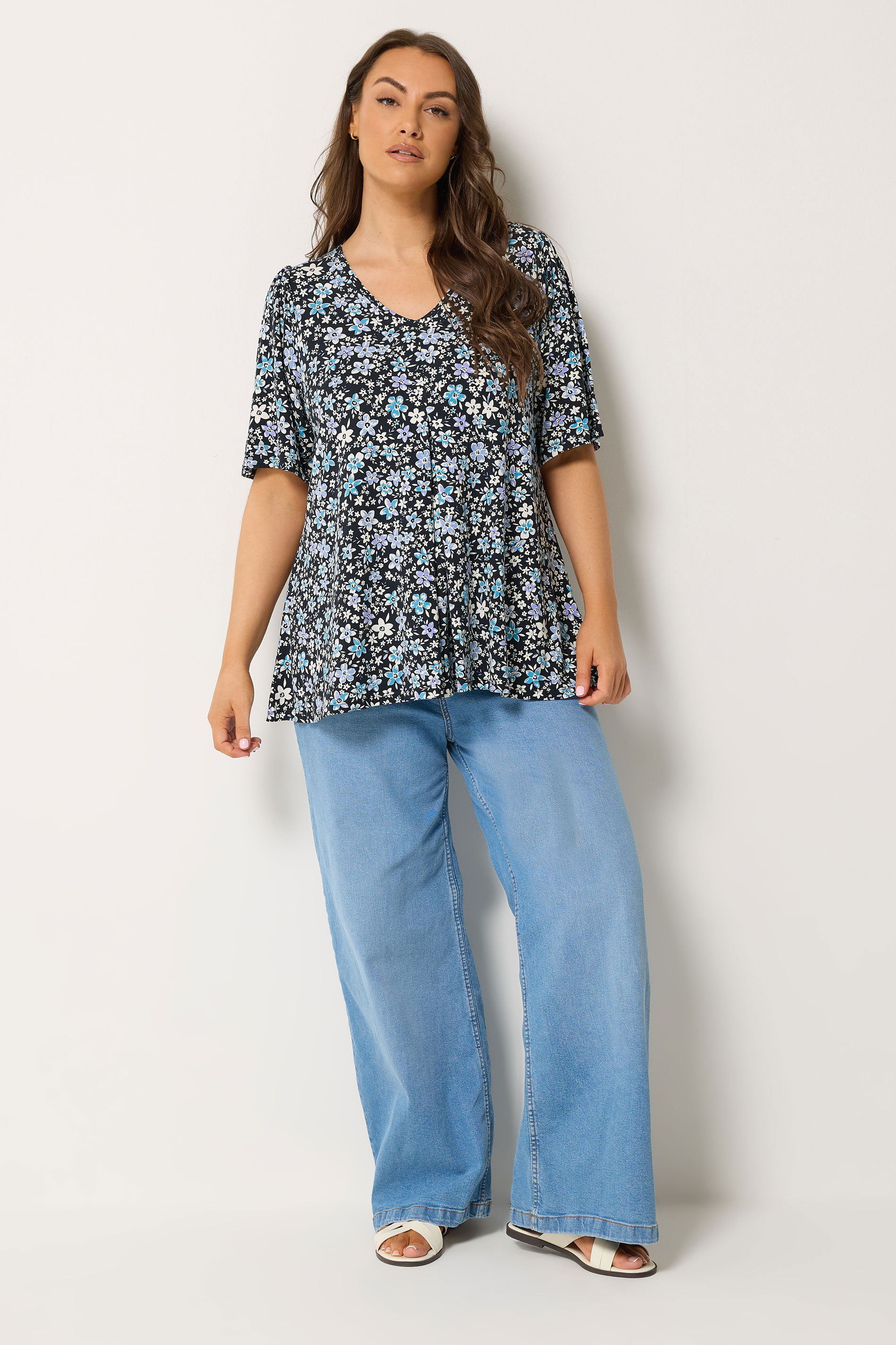 YOURS Plus Size Black Ditsy Floral Swing Top | Yours Clothing 1
