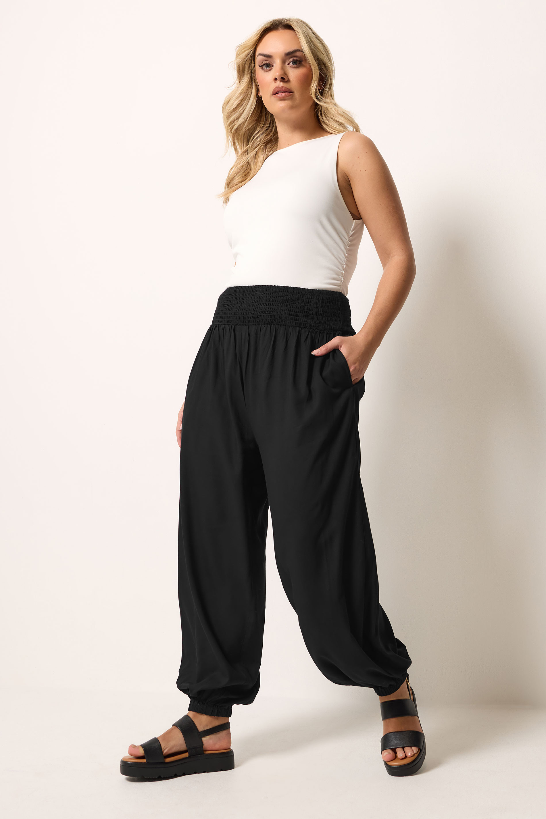 YOURS Plus Size Black Balloon Shirred Waist Trousers | Yours Clothing 1