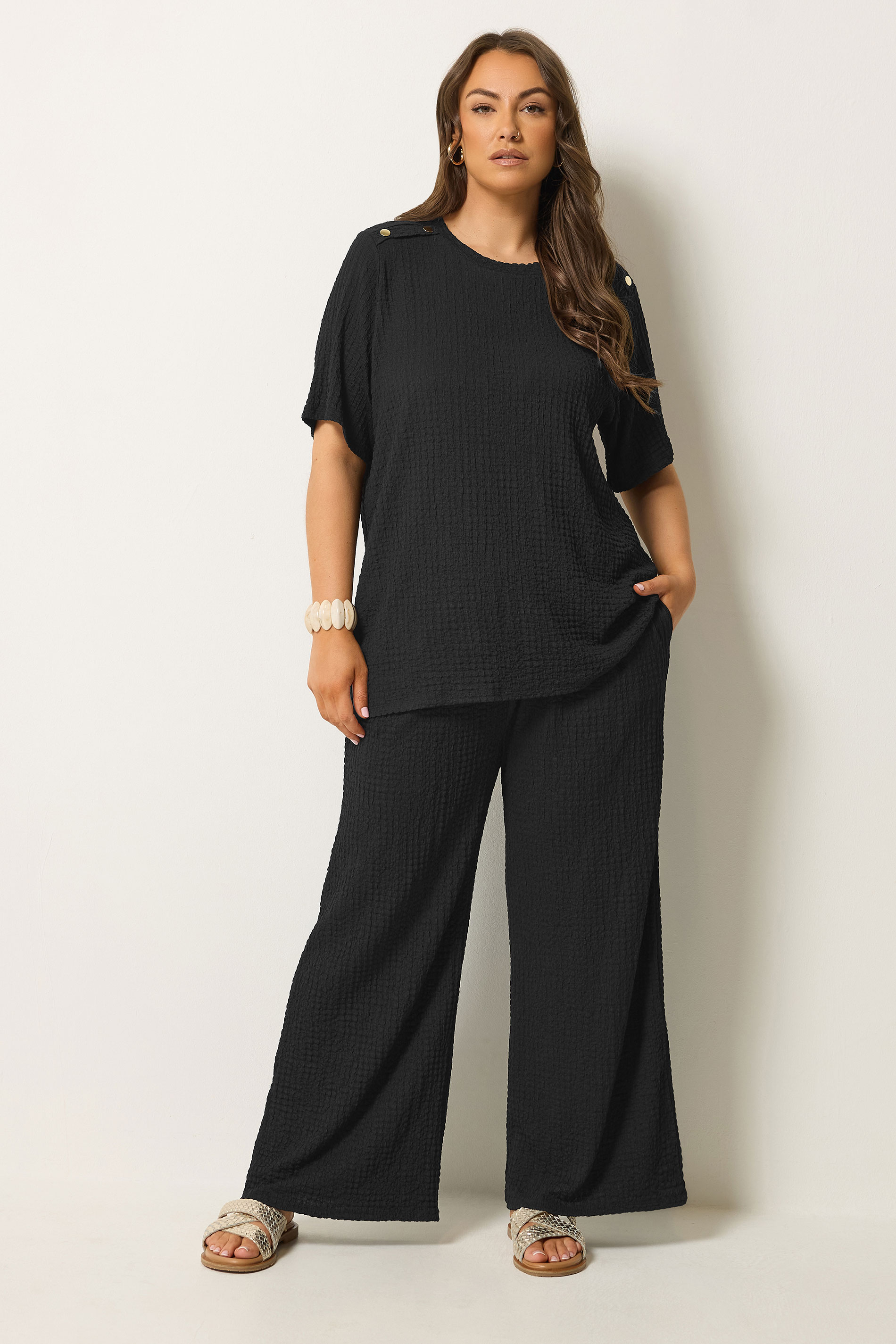 YOURS Plus Size Black Bubble Texture Wide Leg Trousers | Yours Clothing 1