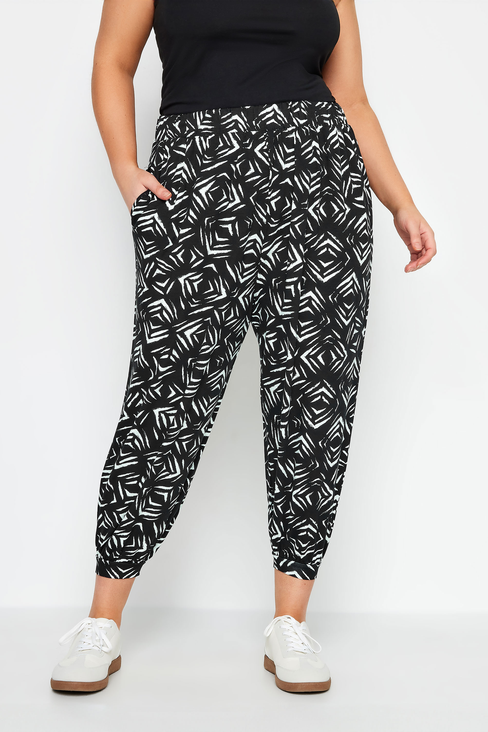 YOURS Plus Size Black Ikat Print Cropped Harem Trousers | Yours Clothing 1