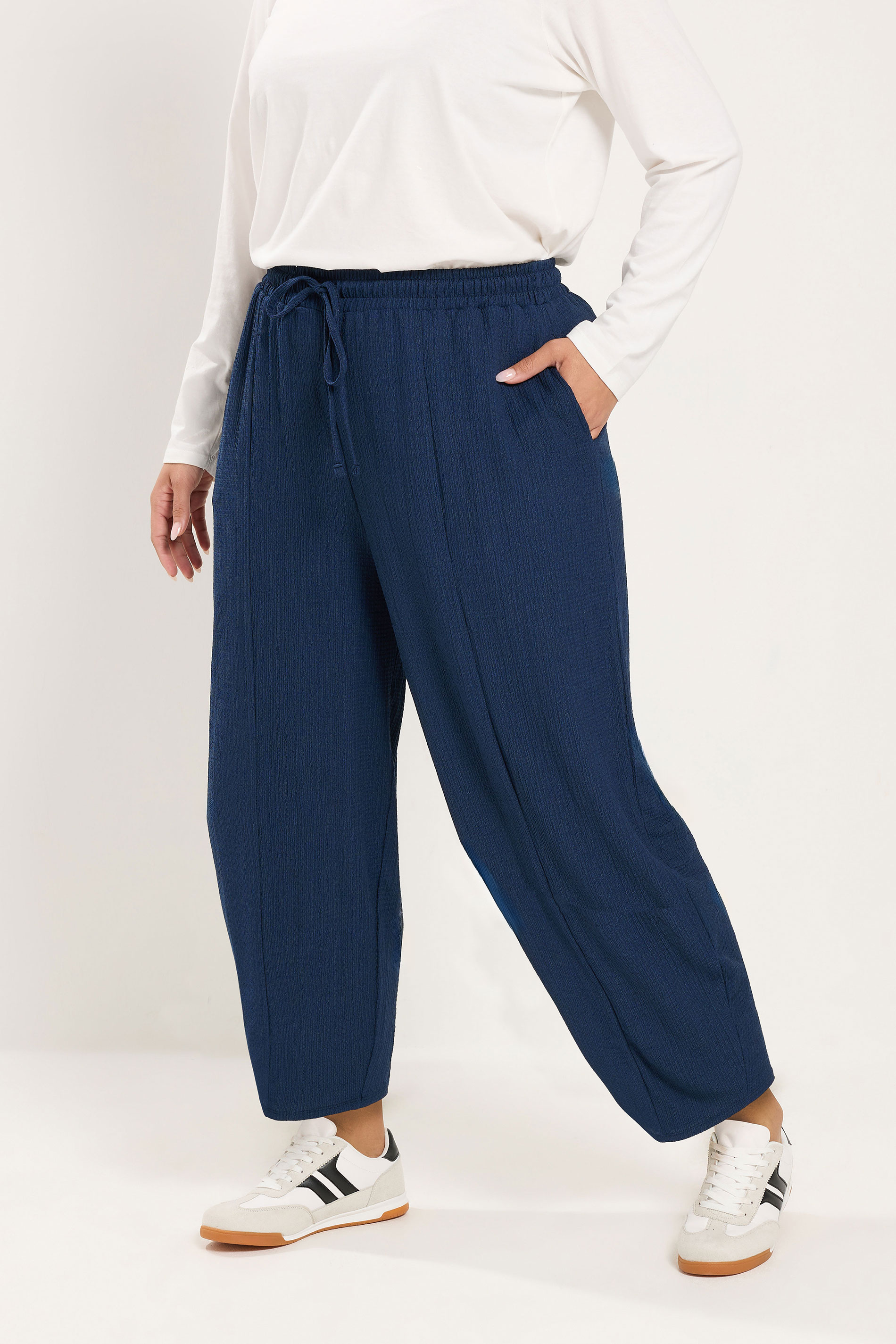 YOURS Plus Size Navy Blue Crinkle Barrel Trousers | Yours Clothing 1