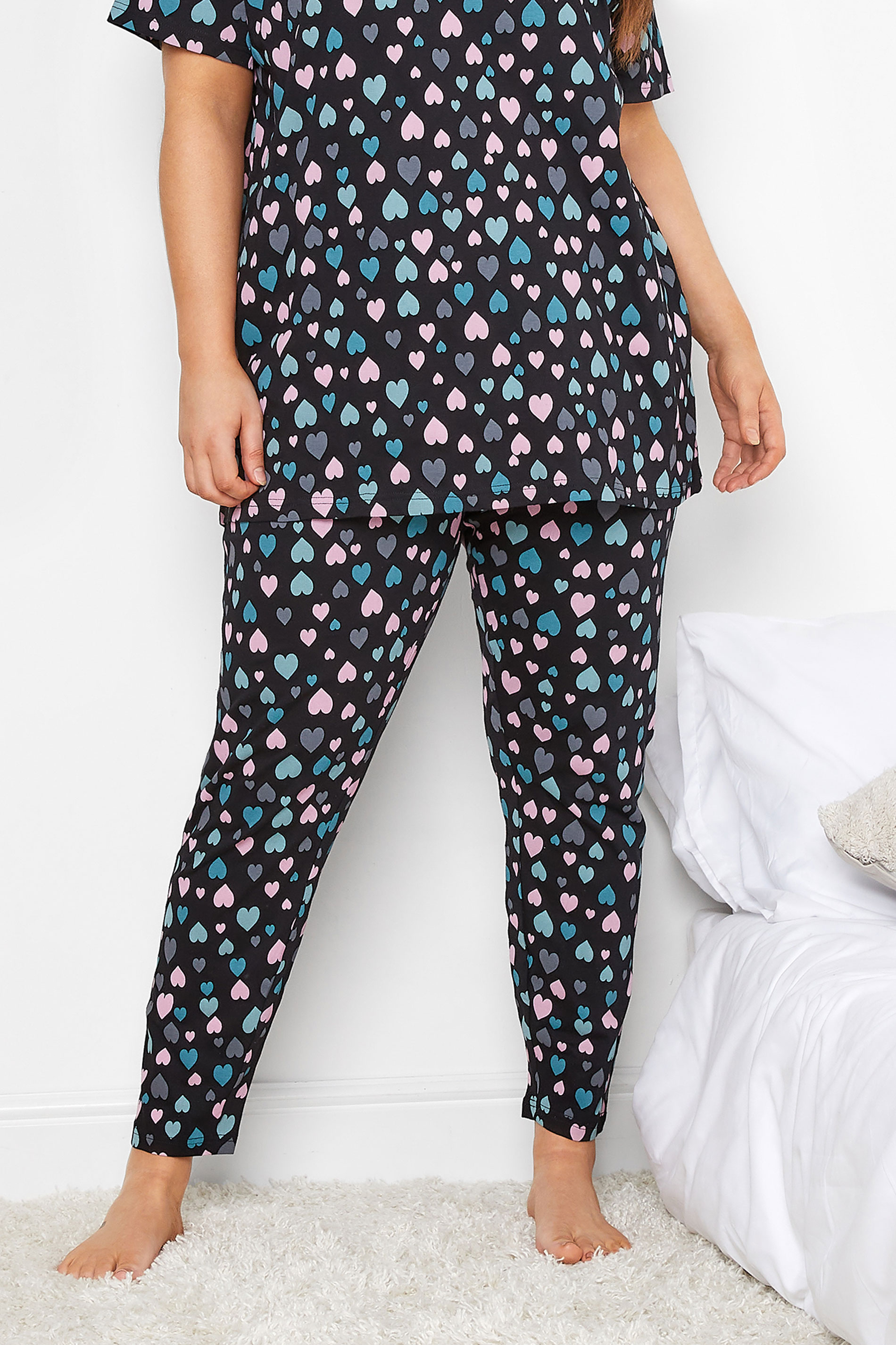 YOURS Plus Size Black Heart Print Tapered Pyjama Bottoms | Yours Clothing 1