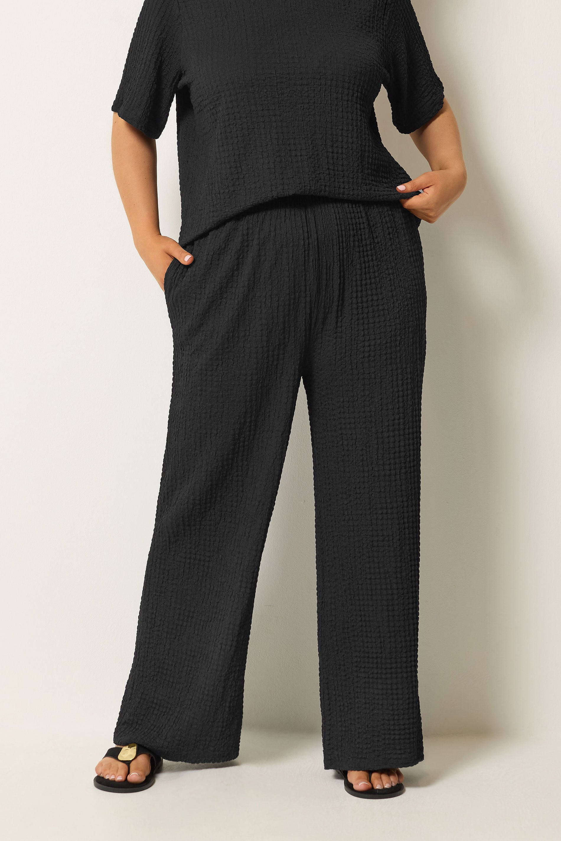 YOURS Plus Size Black Bubble Textured Trousers | Yours Clothing 1