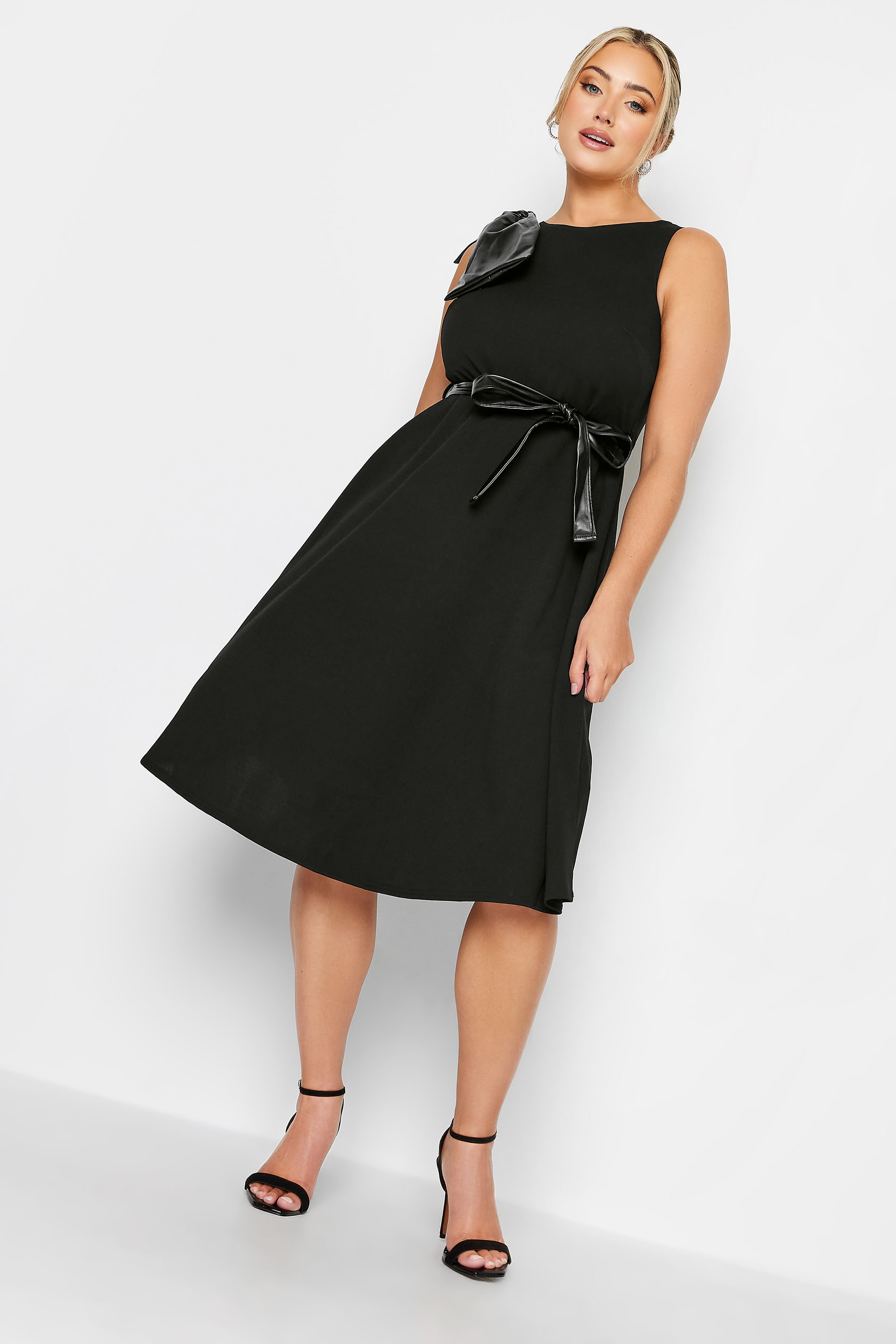 YOURS LONDON Plus Size Black Leather Look Bow Shoulder Midi Skater Dress | Yours Clothing 1