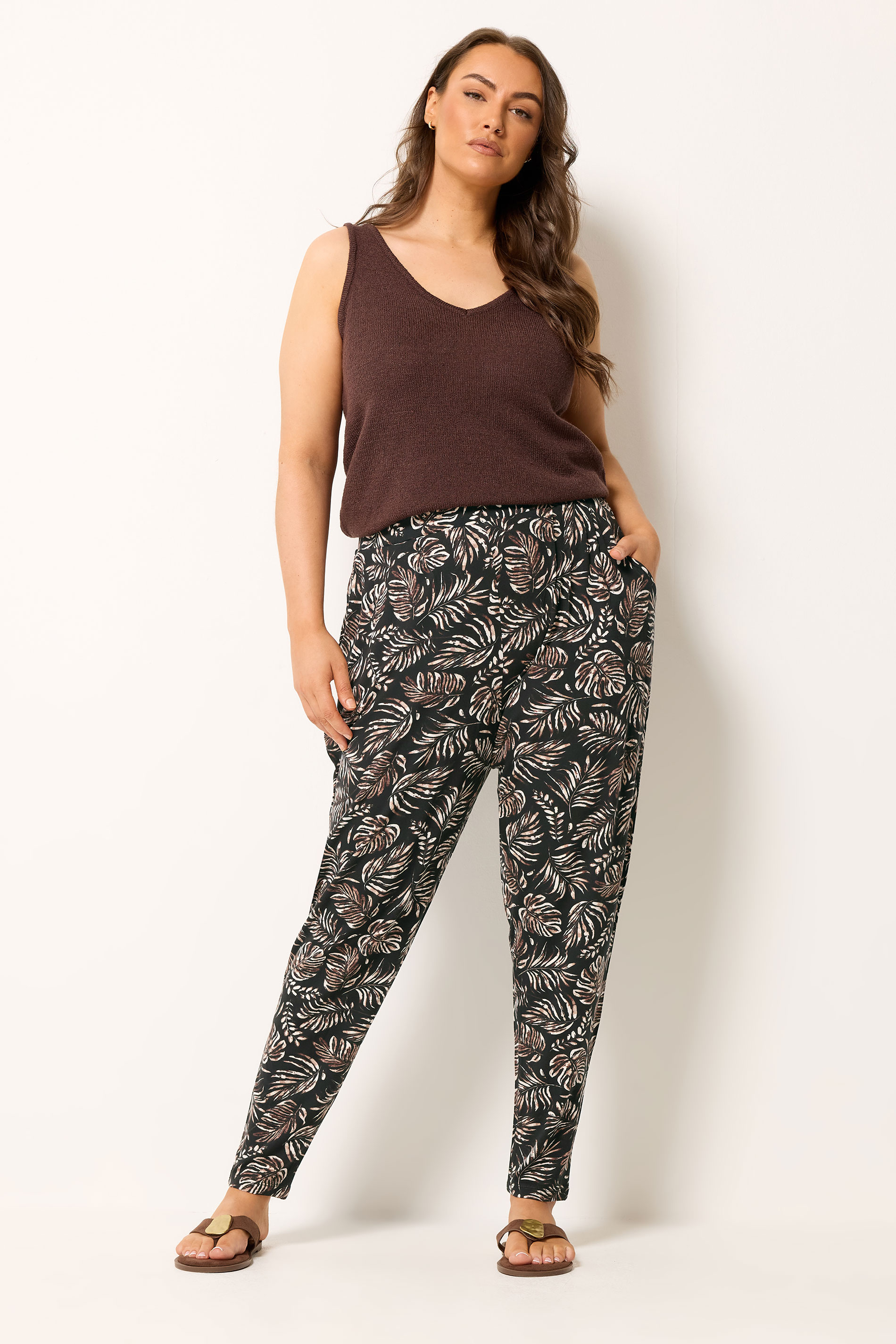 YOURS Plus Size Black Leaf Print Double Pleat Harem Trousers | Yours Clothing 1
