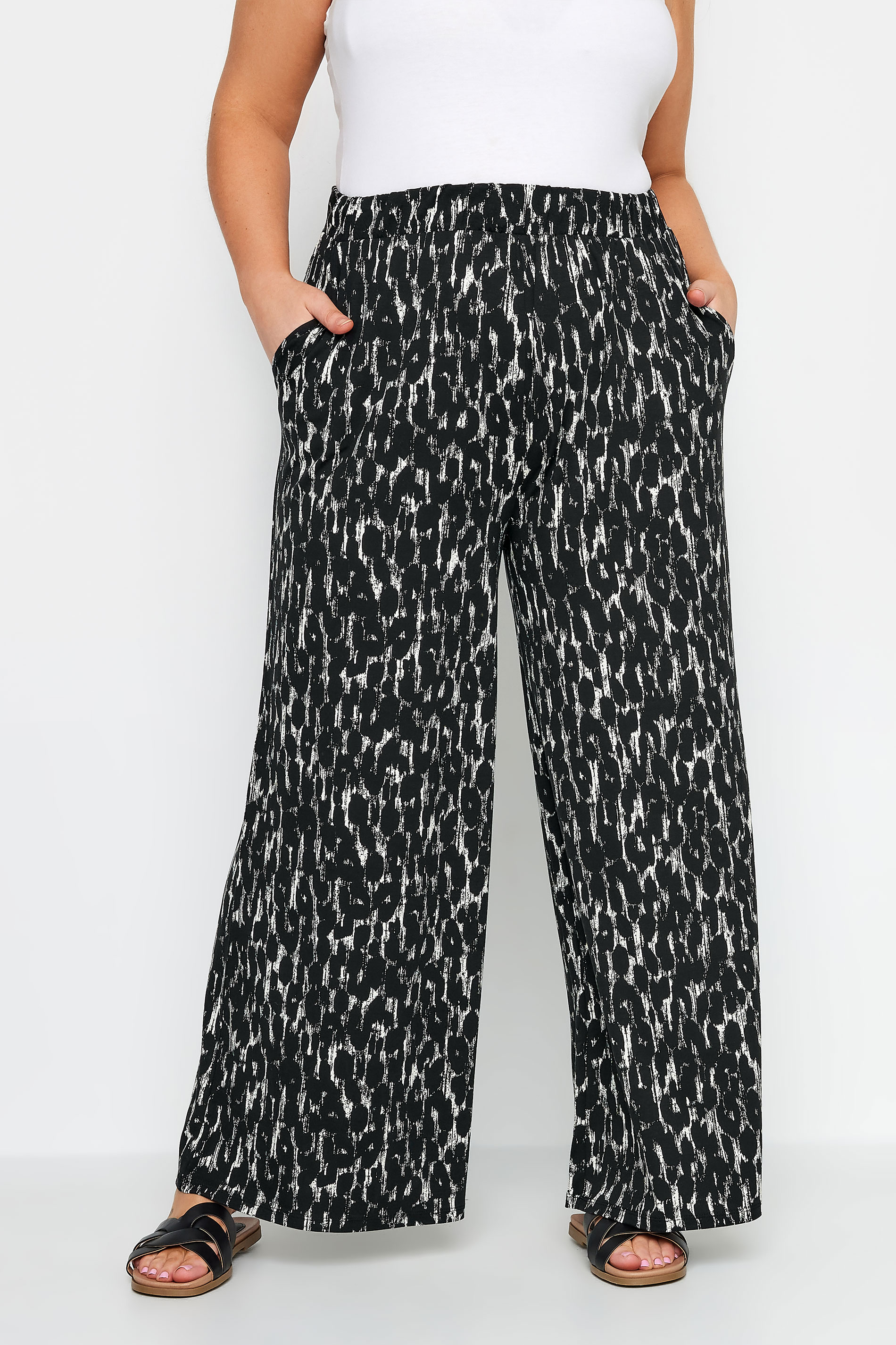 YOURS Plus Size Black Leopard Print Wide Leg Trousers | Yours Clothing 1